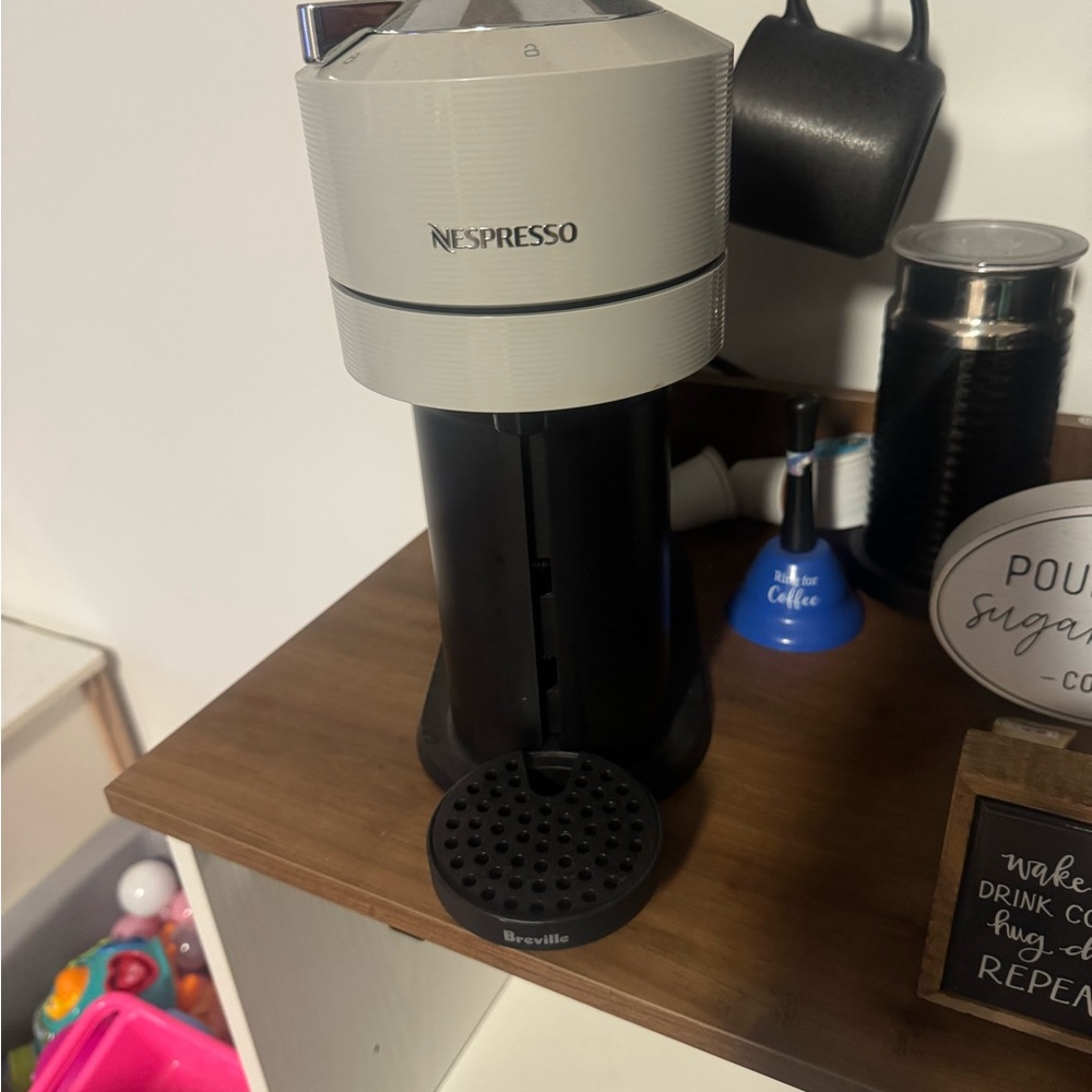 Nespresso Machine in Elegant Black and Cream